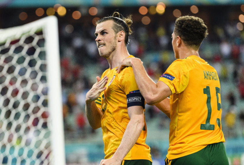 包含威尔士主场取胜，晋级形势大好的词条